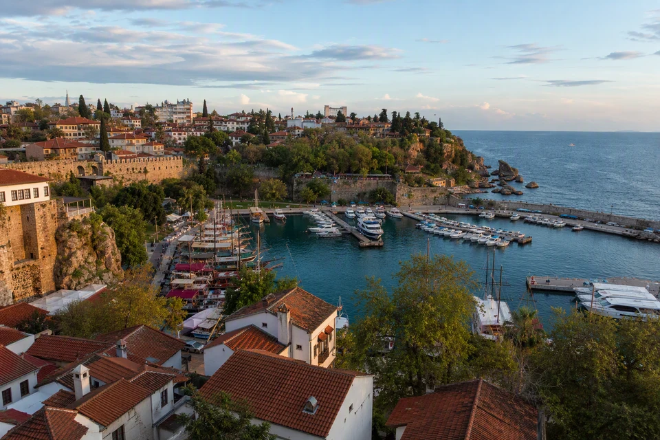 Kaleici Old Harbour with boats, historic walls and red-tiled Antalya roofs, AI recreation